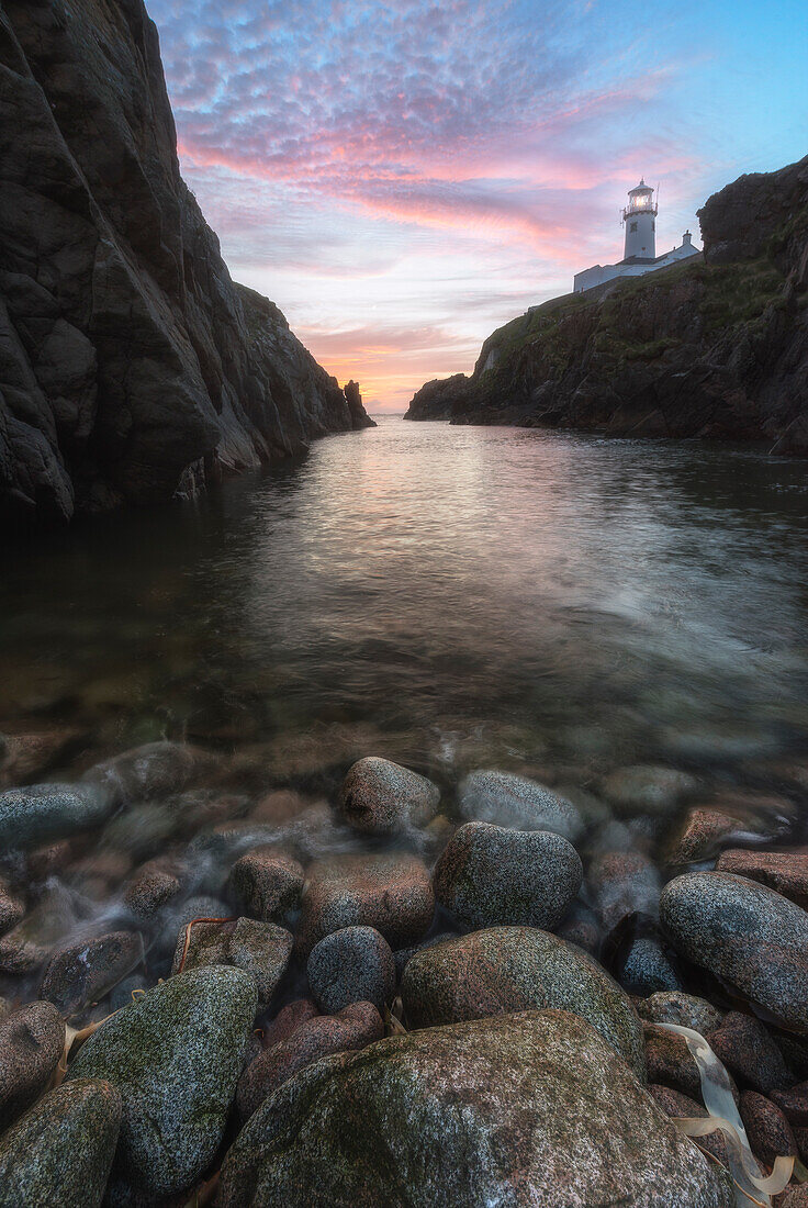 Fanad Head (Fánaid) lighthouse, County Donegal, Ulster region, Ireland, Europe, Pink sunset at Fanad Head