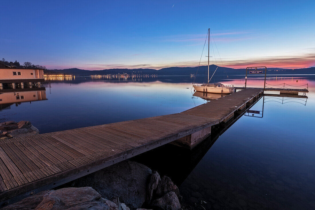 Little pier on Viverone lake at sunset, Viverone, Biella, Piedmont, Italy, Europe