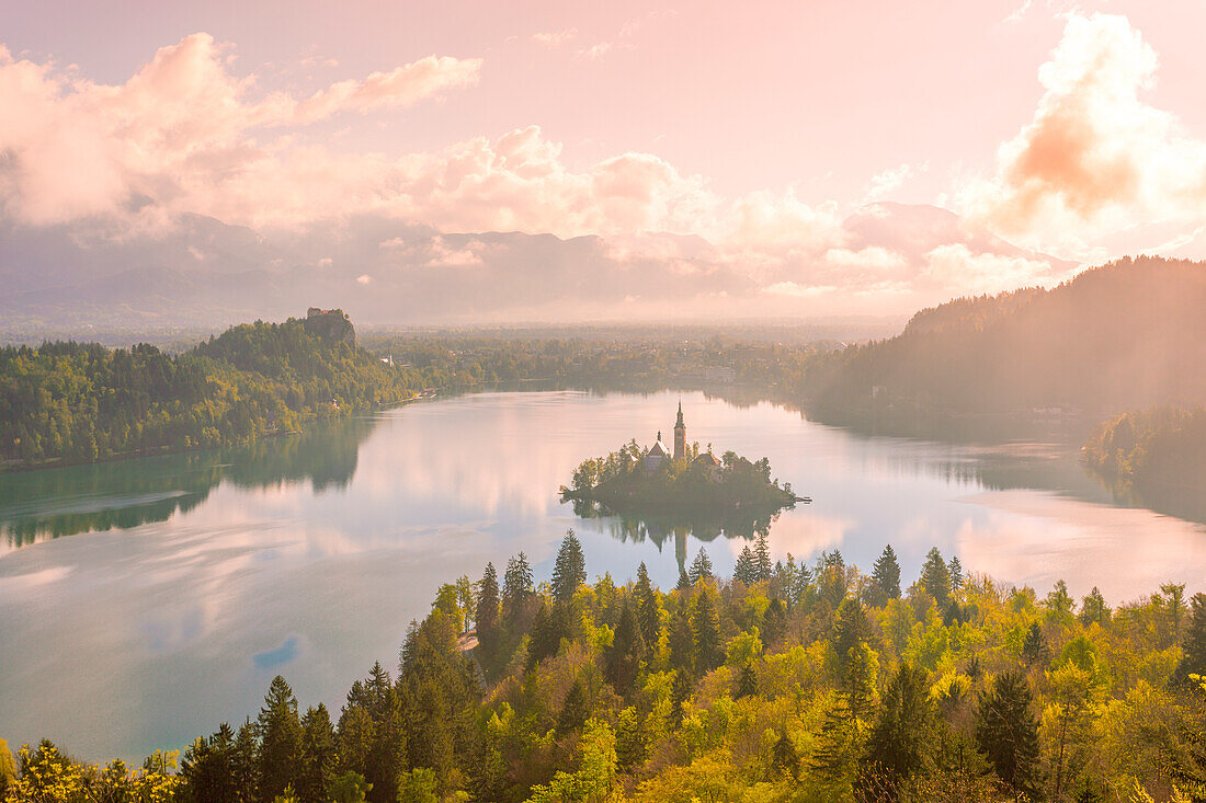 Bled Lake, Slovenia. Sunrise over the misty island from a high point of view