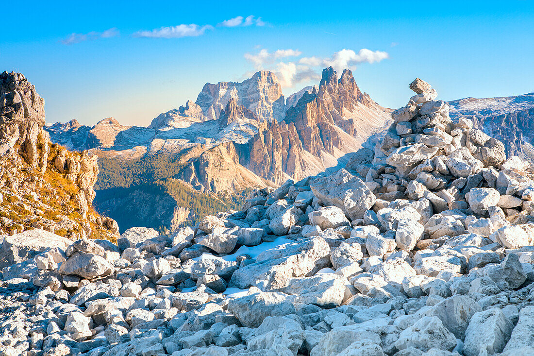 Croda da Lago massif and mount Pelmo in background framed by the trees, Dolomites, Cortina d Ampezzo, Belluno, Veneto, Italy