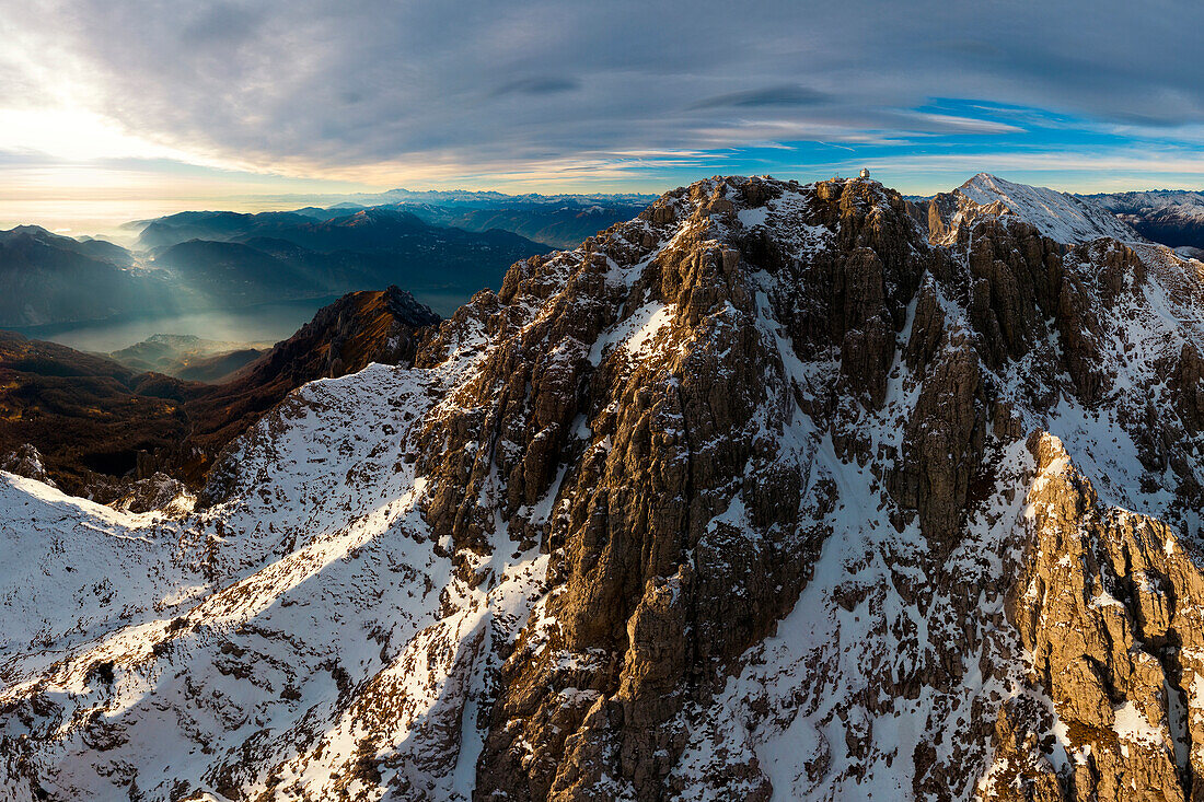 Panoramic view on the summit of mount Grigna Meridionale at sunset in winter, grigna meridionale, province of lecco, lombardy, italy, europe