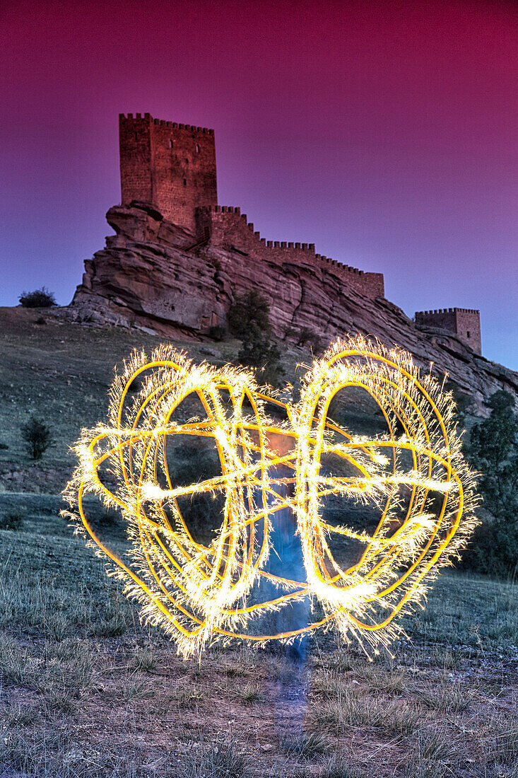 Light painting in front of Castle of Zafra, Campillo de Duenas, Guadalajara, Castilla La Mancha, Spain