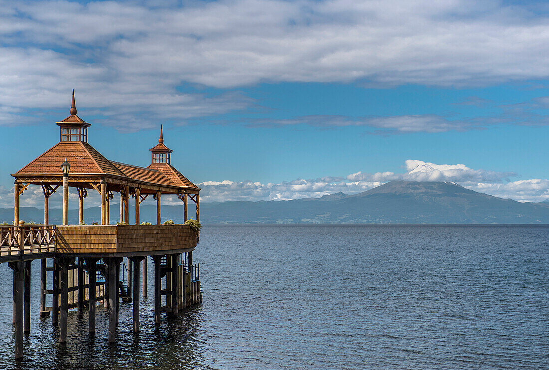 Pavilion at end of pier at Llanquihue Lake with view of volcano Osorno, Frutillar, Llanquihue province, Chile