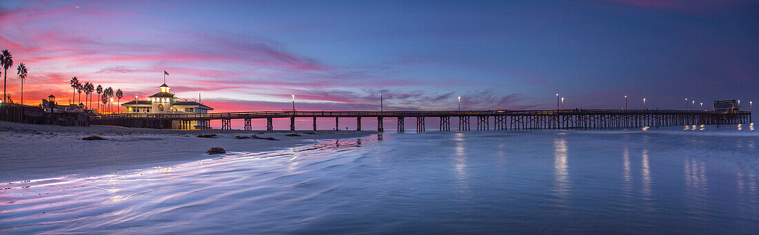 Panorama of Newport Beach pier at dawn, Orange County, California, USA