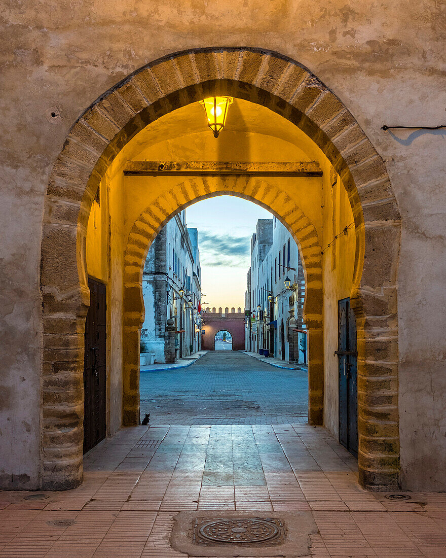 Arched entrance through city walls to medina old town, Essaouira, Marrakesh-Safi, Morocco