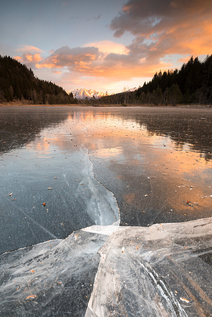 The ice surface of lake in Pian Gembro, Aprica, Province of Sondrio, Valtellina, Lombardy, Italy, Europe