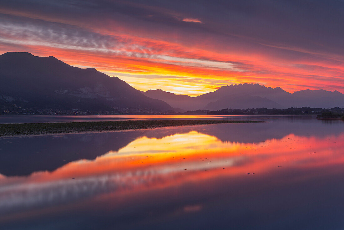 Lecco mountains on fire, sunrise on lake Pusiano, Lecco province, Brianza, Lombardy, Italy, Europe