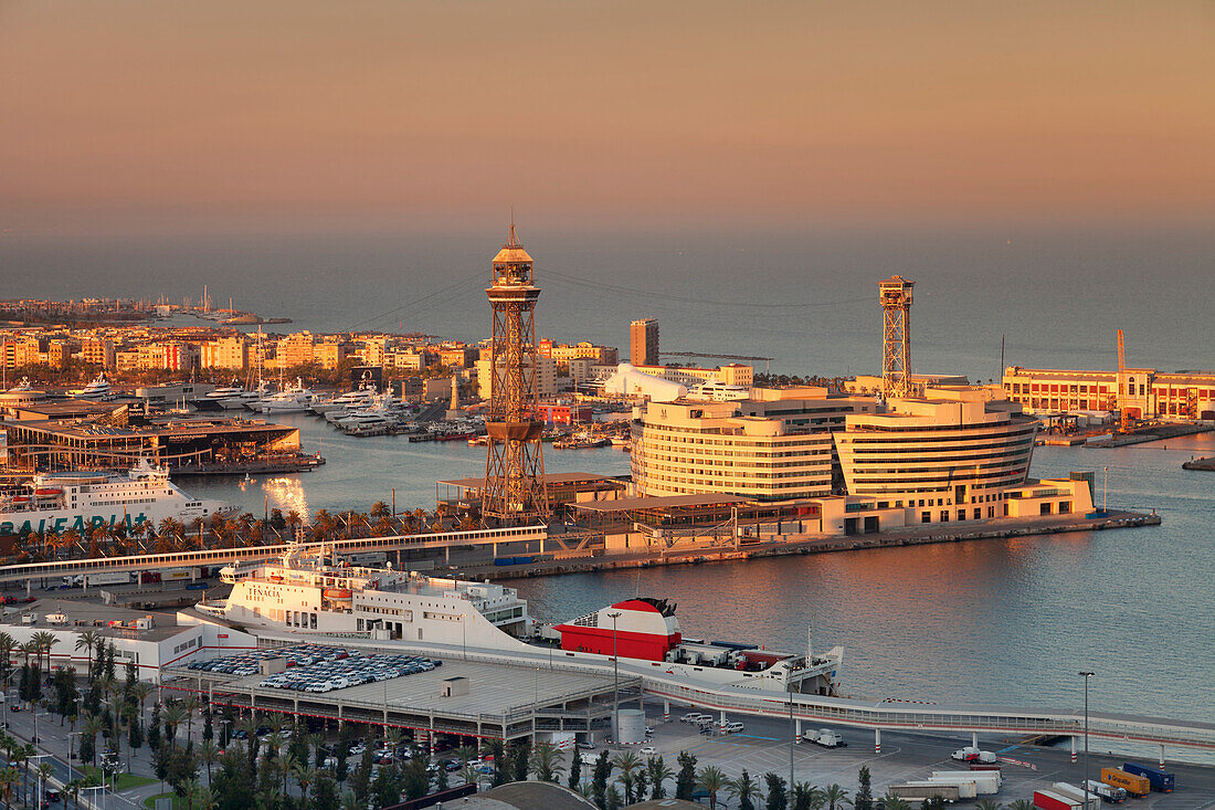 View from Montjuic to Port Vell with World Trade Center at Port Vell and Torre de Sant Jaume I , Barcelona, Catalonia, Spain, Europe