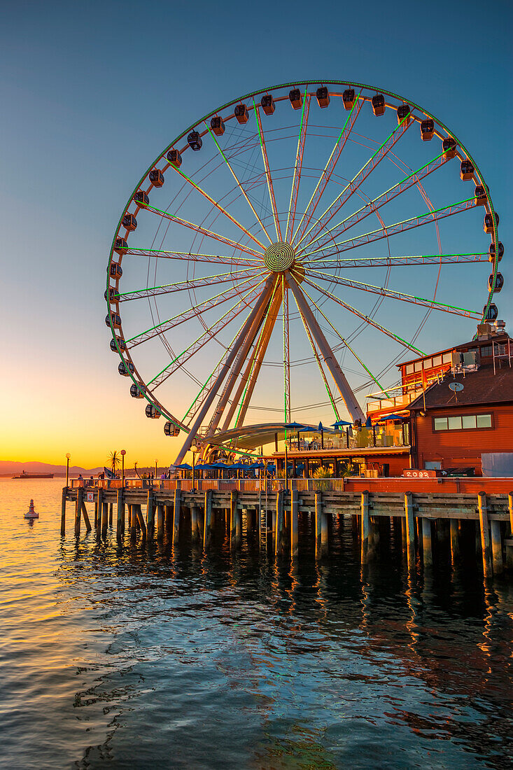 Seattle's Great Wheel on Pier 57 at golden hour, Seattle, Washington State, United States of America, North America