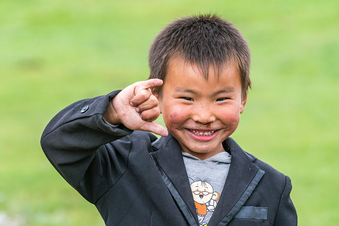 Portrait of a Mongolian nomadic little boy, North Hangay province, Mongolia, Central Asia, Asia
