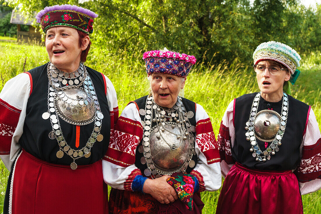 Three Seto women, singing polyphonically at a Feast Day, Uusvada, Setomaa, SE Estonia, Europe