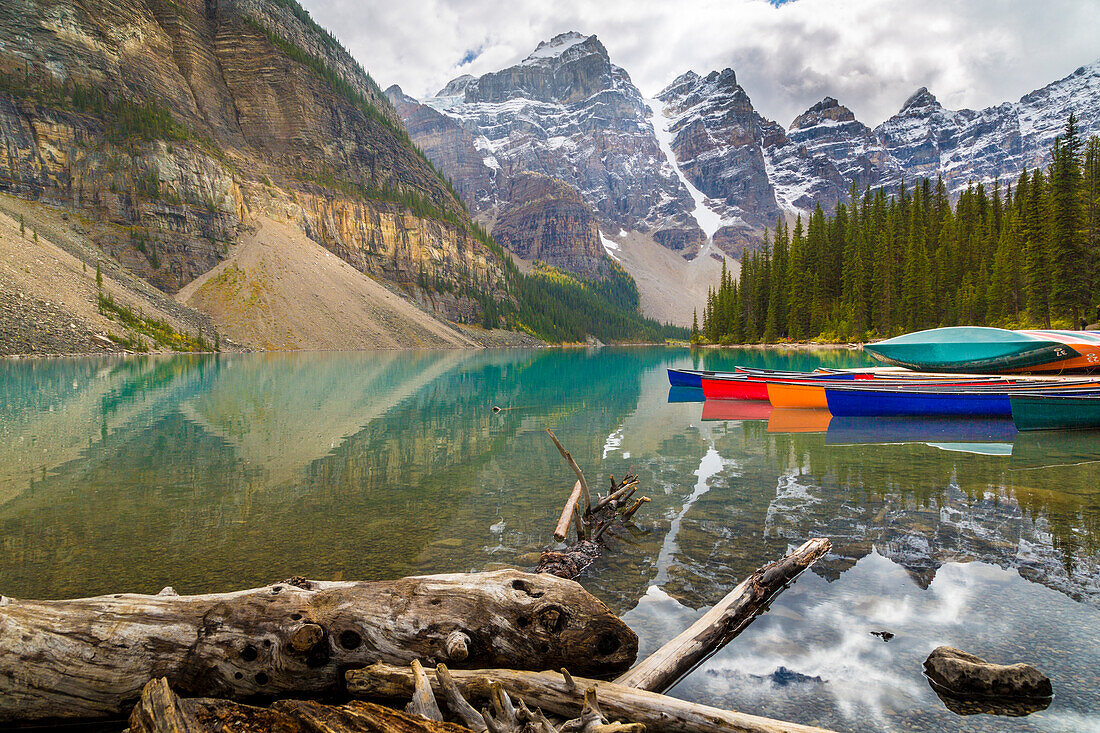 Tranquil setting of rowing boats on Moraine Lake, Banff National Park, UNESCO World Heritage Site, Canadian Rockies, Alberta, Canada, North America
