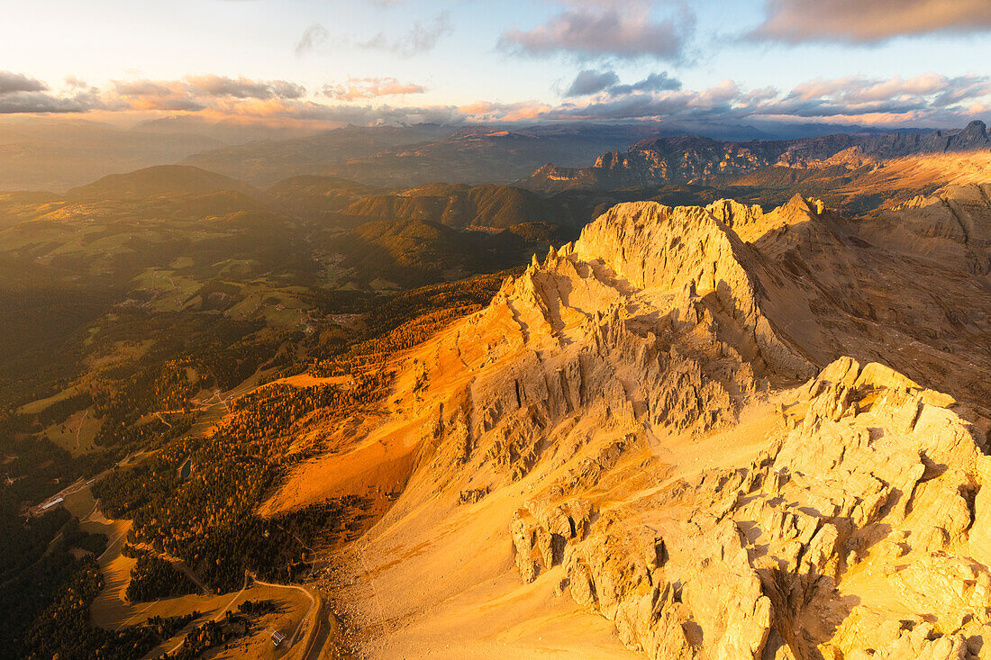 Aerial view of Latemar massif and Obereggen at sunset, Dolomites, South Tyrol, Italy, Europe