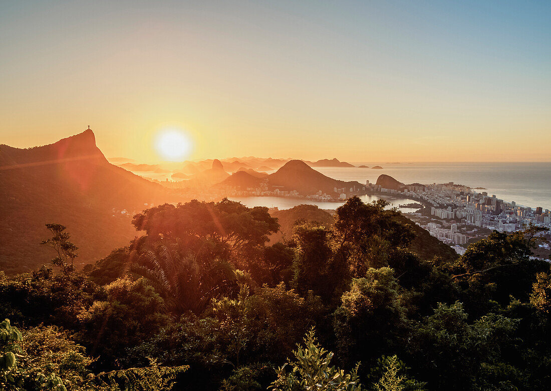 View from Vista Chinesa over Tijuca Forest towards Rio de Janeiro at sunrise, Brazil, South America