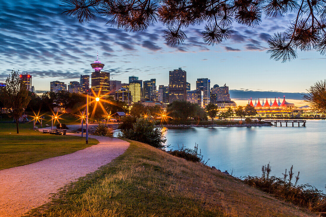 View of city skyline and Vancouver Lookout Tower from CRAB Park at Portside, Vancouver, British Columbia, Canada, North America