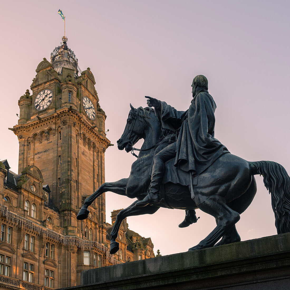 Duke of Wellington monument with the Balmoral clock behind, Edinburgh, Scotland, United Kingdom, Europe