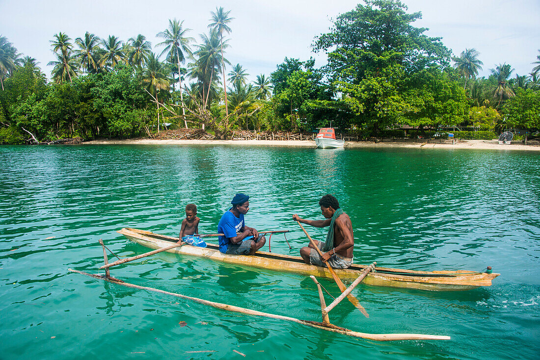 Locals in a dugout canoe, Kavieng, New Ireland, Papua New Guinea, Pacific