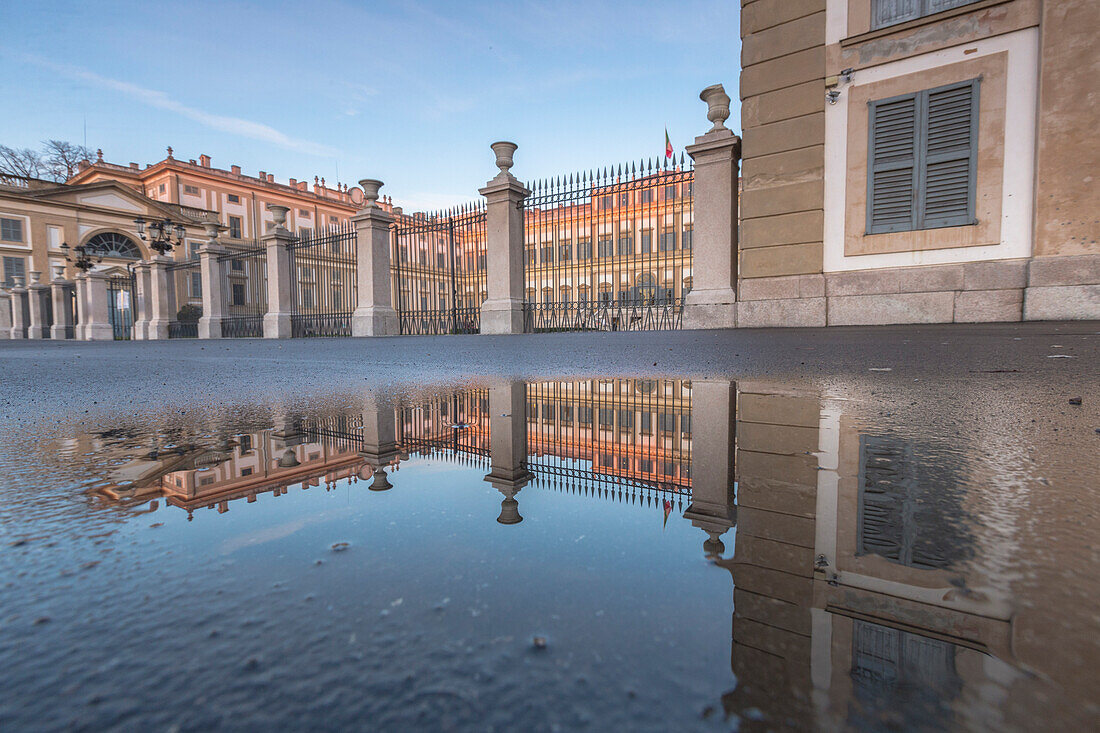 Villa Reale reflected in a puddle, Monza, Lombardy, Italy, Europe