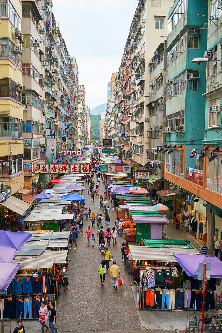 A busy market street in Mong Kok (Mongkok), Kowloon, Hong Kong, China, Asia