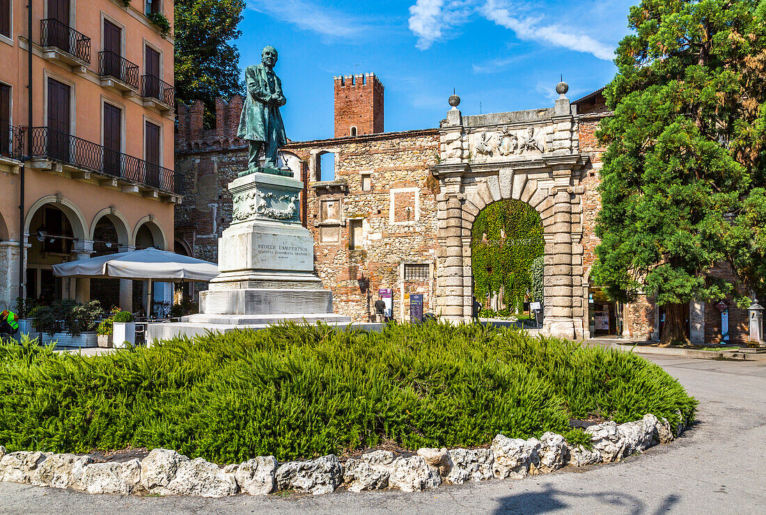 View of entrance to Olympic Theater and statue of Fedele Lampertico, Vicenza, Veneto, Italy, Europe