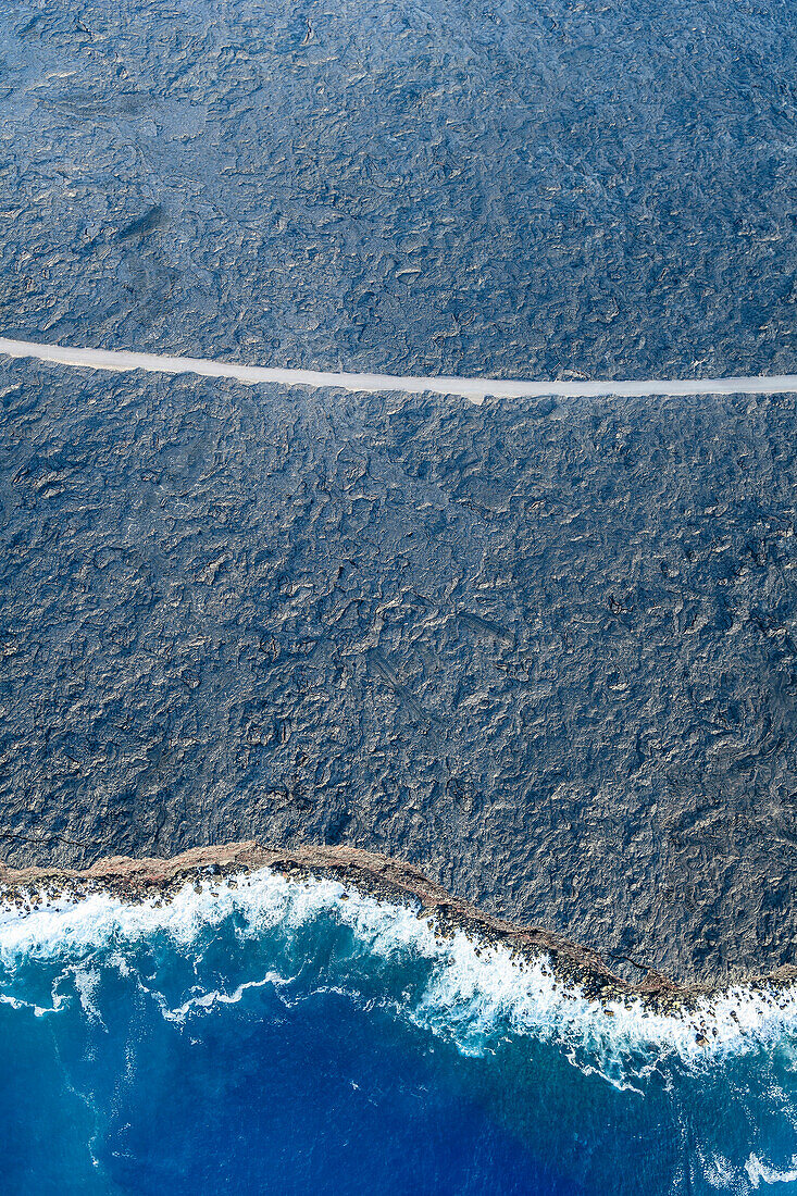 Aerial view of ocean waves on beach, Big Island, Hawaii, United States