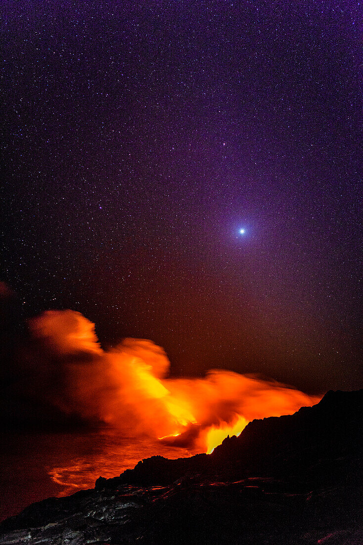 Smoke from molten lava at night