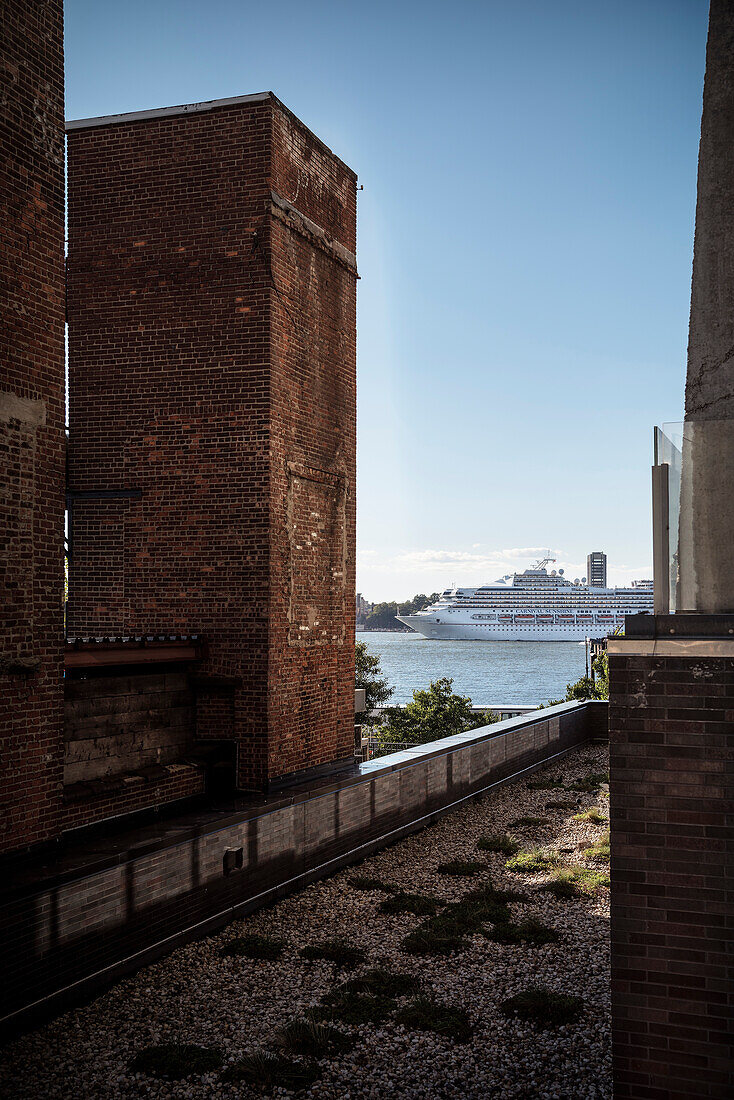 View from High Line Park towards the Hudson River where a cruise ship drives, Manhattan, NYC, New York City, United States of America, USA, North America