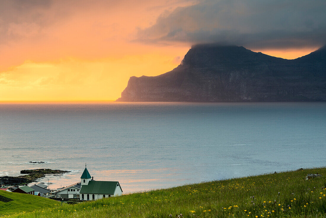 Church on the ocean shore towards Kalsoy Island, Gjogv, Eysturoy Island, Faroe Islands, Denmark, Europe