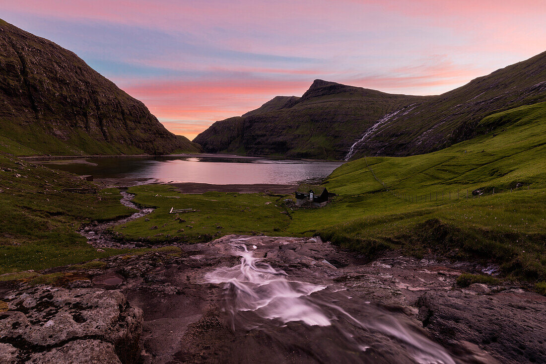 Sunset on lagoon surrounded by mountains, Saksun, Streymoy Island, Faroe Islands, Denmark, Europe