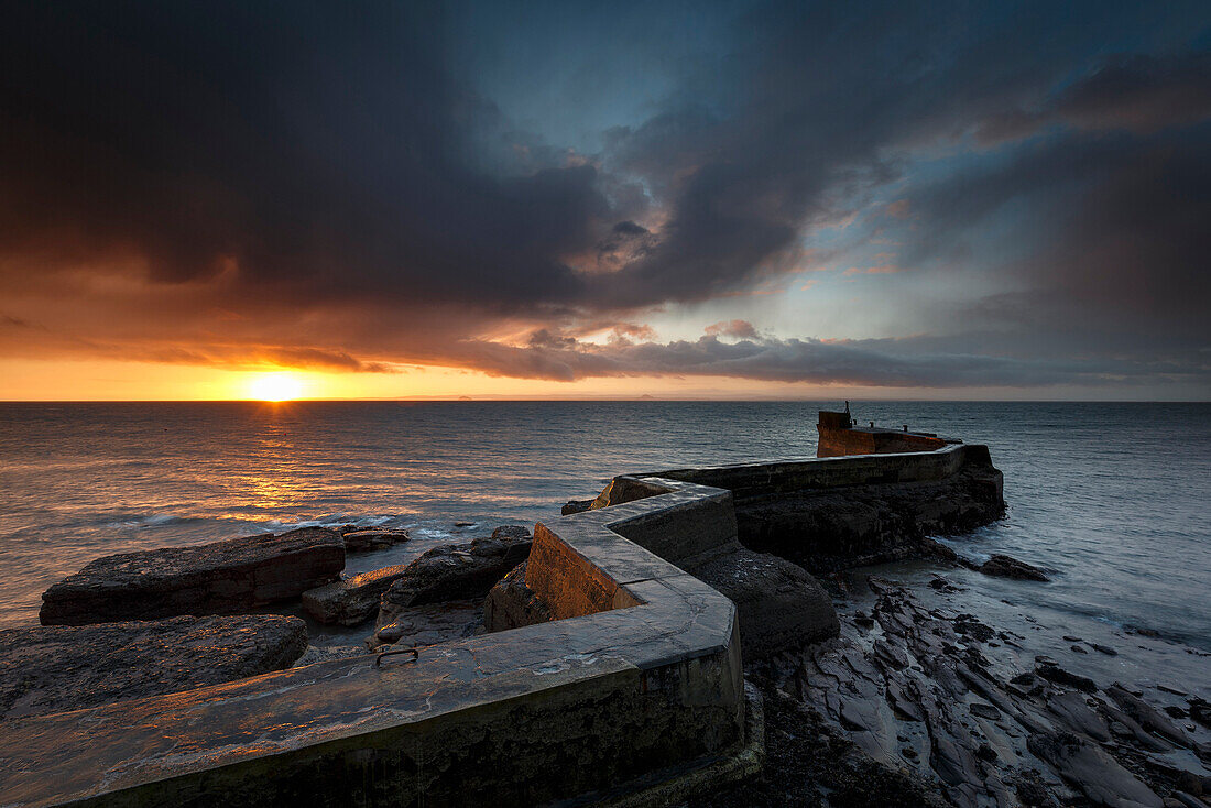 The Blocks (the ZigZag) breakwater at sunrise at the harbour of St. Monans in Fife, East Neuk, Scotland, United Kingdom, Europe