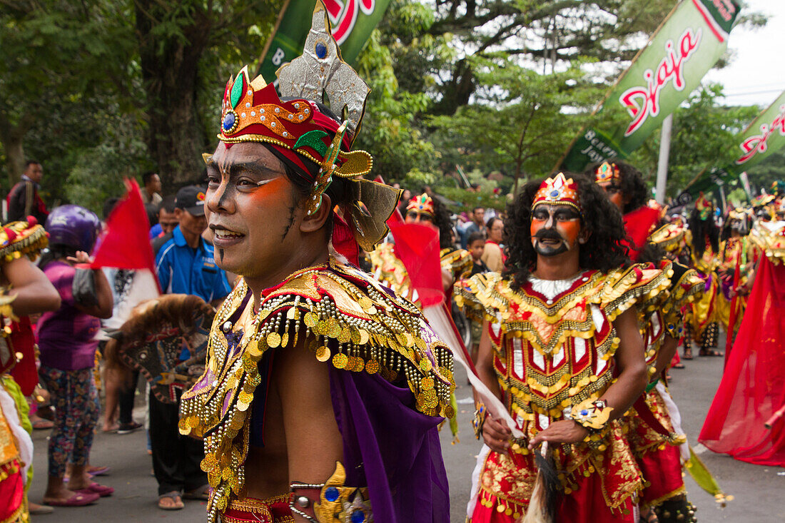 Indonesian men taking part in a carnival celebrating Malang's 101st year anniversary, Malang, East Java, Indonesia, Southeast Asia, Asia