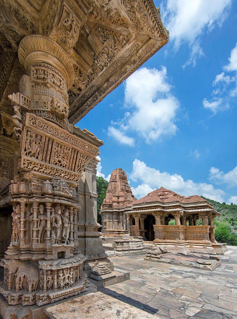 The Sas-Bahu Temples consisting of two temples and a stone archway with exquisite carvings depicting Hindu deities, near Udaipur, Rajasthan, India, Asia