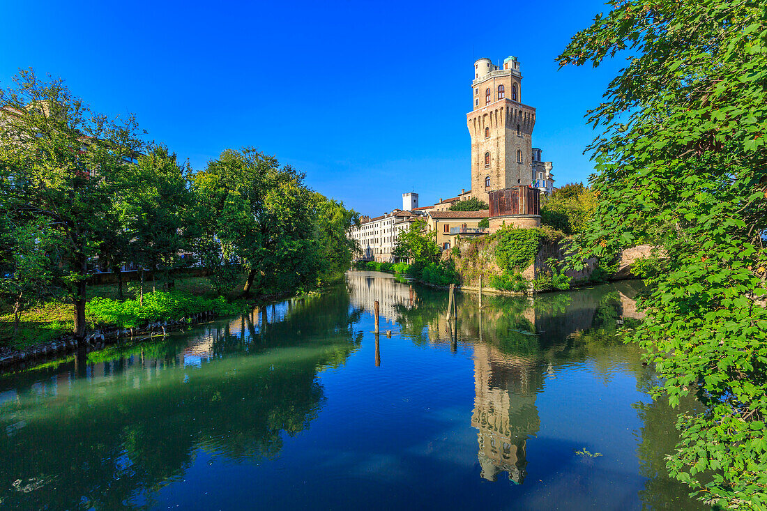 View of Museum of The Astronomical Observatory of Padua reflecting in river, Padua, Veneto, Italy, Europe