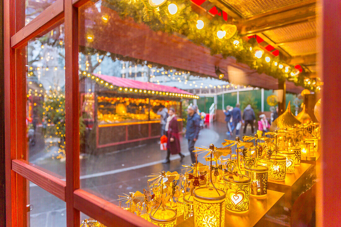 Christmas Market Stalls and shoppers in Leicester Square, London, England, United Kingdom, Europe