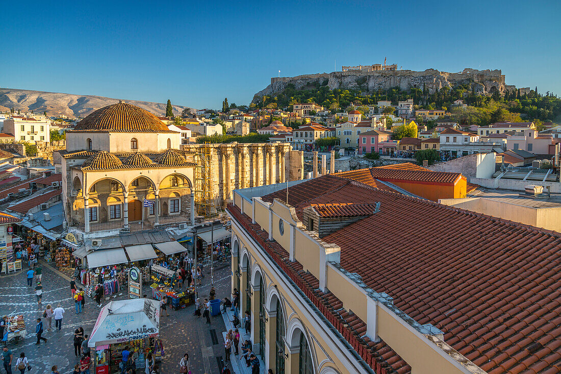 Elevated view of Monastiraki Square with The Acropolis visible in background during late afternoon, Monastiraki District, Athens, Greece, Europe