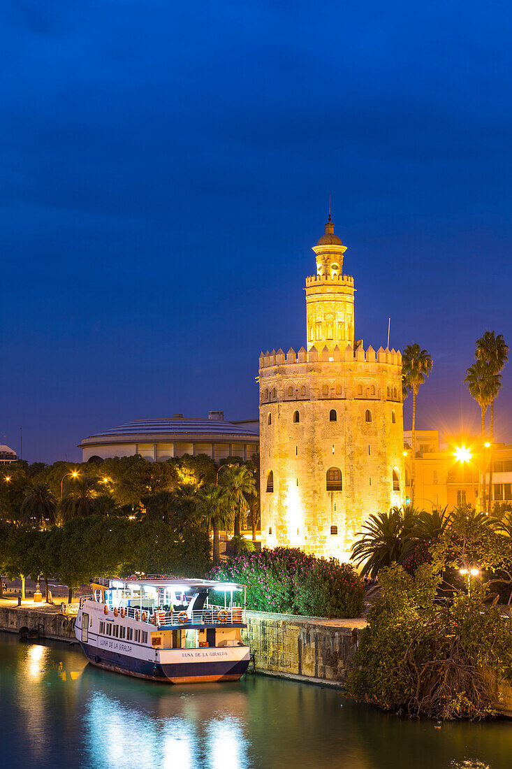 Torre del Oro (Gold Tower) and river Rio Guadalquivir at night, Seville, Andalusia, Spain, Europe