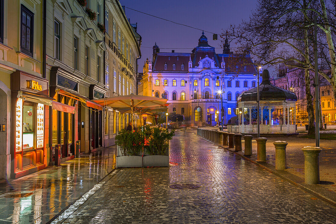 View of University of Ljubljana in Congress Square at dusk, Ljubljana, Slovenia, Europe