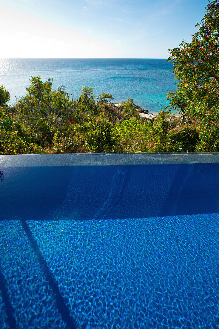 The pool of the Villa at the Lizard Island Resort is high above the ocean