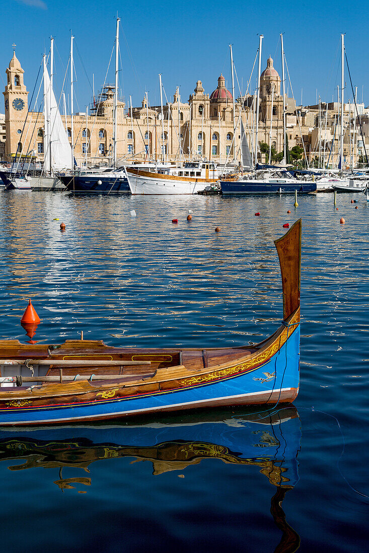 Traditional boat moored in Grand Harbour marina at Birgu, Valletta, Malta, Mediterranean, Europe