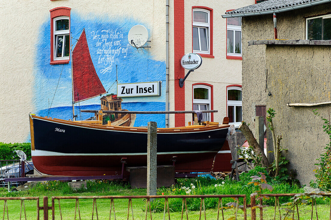 Pub with old fishing boat in Kirchdorf, Insel Poel, Ostseeküste, Mecklenburg-Western Pomerania, Germany