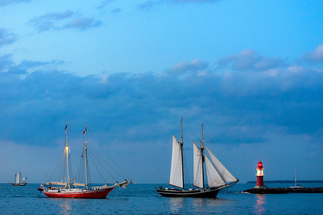 Sailboats in Warnemünde with lighthouse to the Hanse Sail, Warnemünde, Rostock, Ostseeküste, Mecklenburg-Western Pomerania, Germany