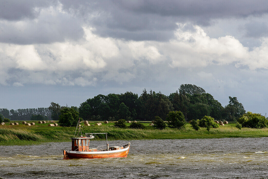 Small wood fishing boat on island Ummanz, Baltic Sea coast, Mecklenburg-Western Pomerania Germany