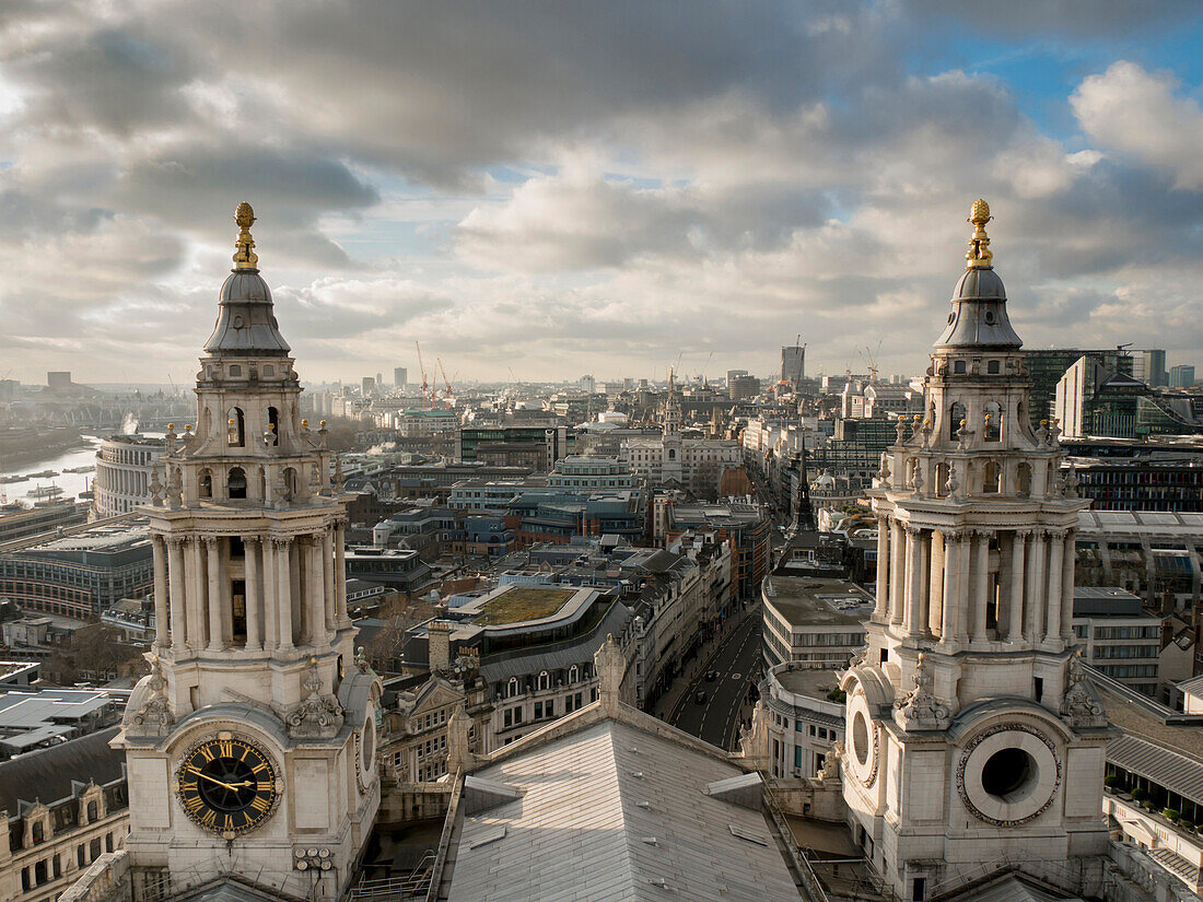 St. Pauls Cathedral twin spires frame cityscape, London, England, United Kingdom, Europe
