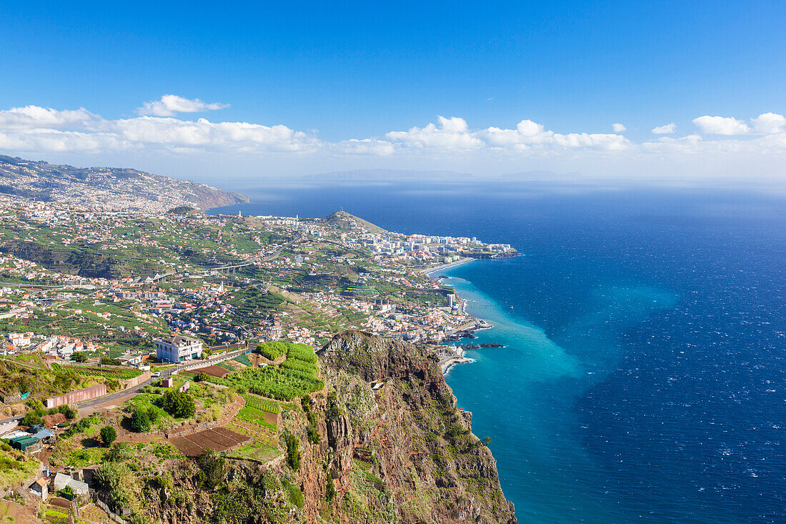 The southern coastline of Madeira towards Funchal from the high sea cliff headland Cabo Girao, Madeira, Portugal, Atlantic, Europe