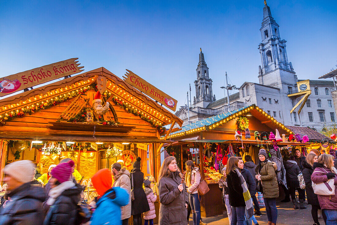 View of visitors and Christmas Market stalls at Christmas Market, Millennium Square, Leeds, Yorkshire, England, United Kingdom, Europe