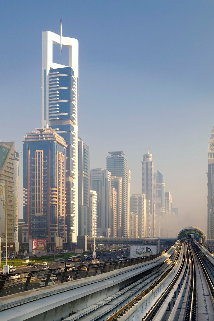 View of the Dubai metro rapid transit rail network and skyscrapers, Dubai, United Arab Emirates, Middle East