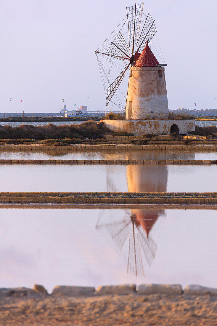 Windmill reflected in the salt flats, Saline dello Stagnone, Marsala, province of Trapani, Sicily, Italy, Mediterranean, Europe