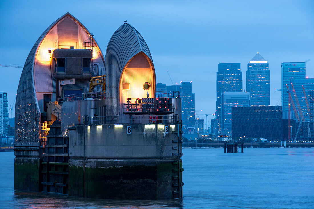 Thames Barrier and Canary Wharf at dusk, London, England, United Kingdom, Europe