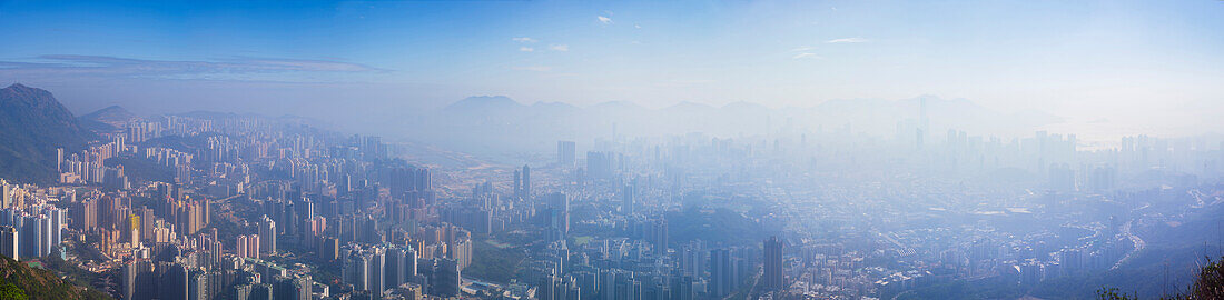 Panoramic view of Kowloon and Hong Kong city from the Lion Rock mountain peak, Hong Kong, China, Asia