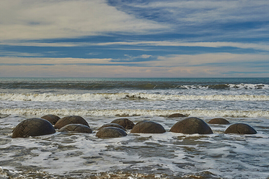Moeraki Boulders, a group of very large spherical boulders on Koekohe Beach near Moeraki on the coast of Otago, South Island, New Zealand, Pacific